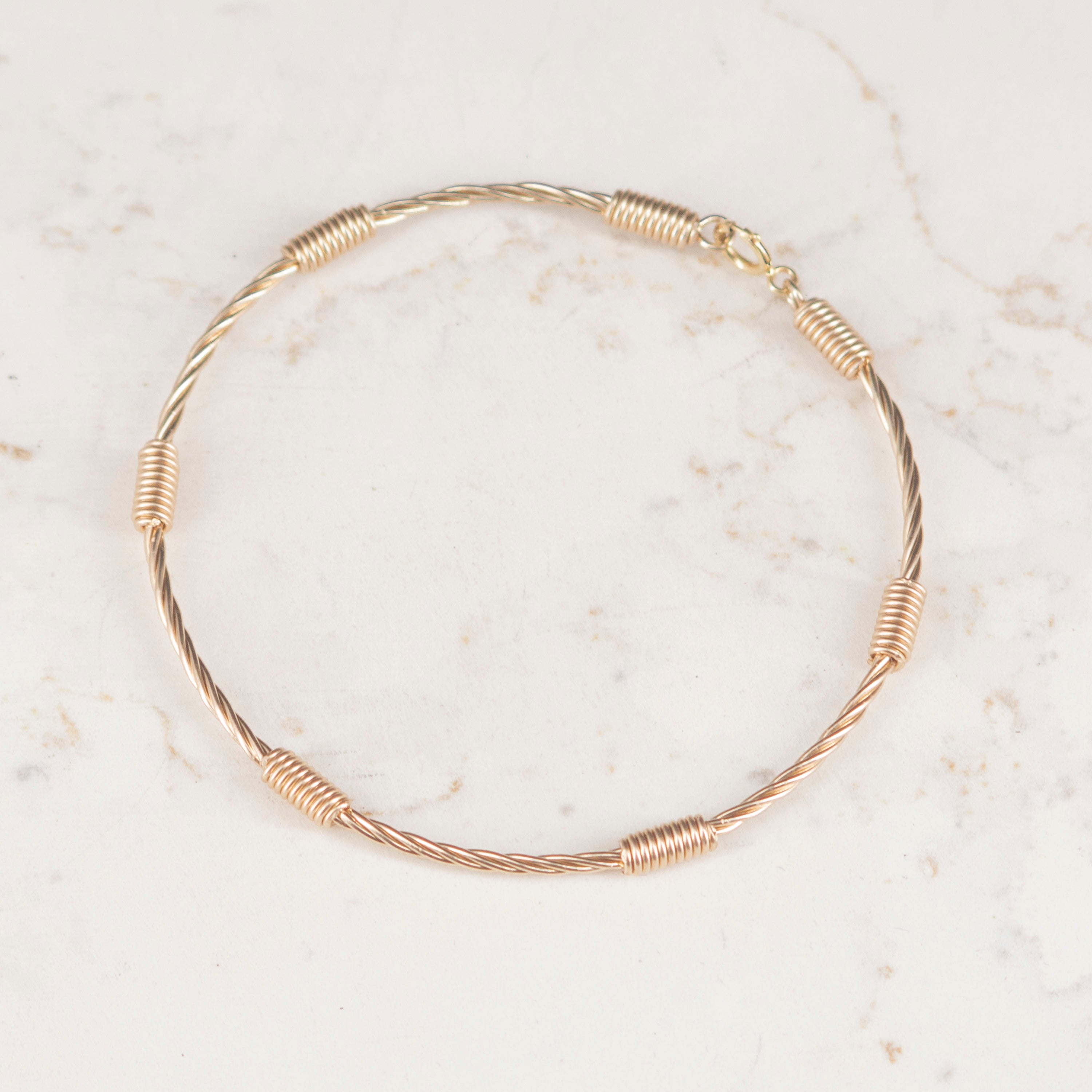 Pulsera rustica  7 nudos | Oro laminado