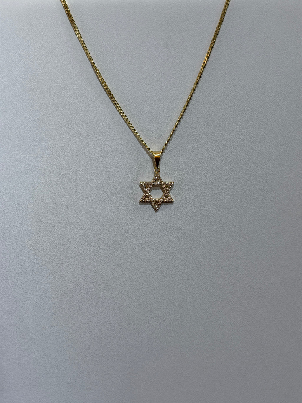 Dije de estrella
